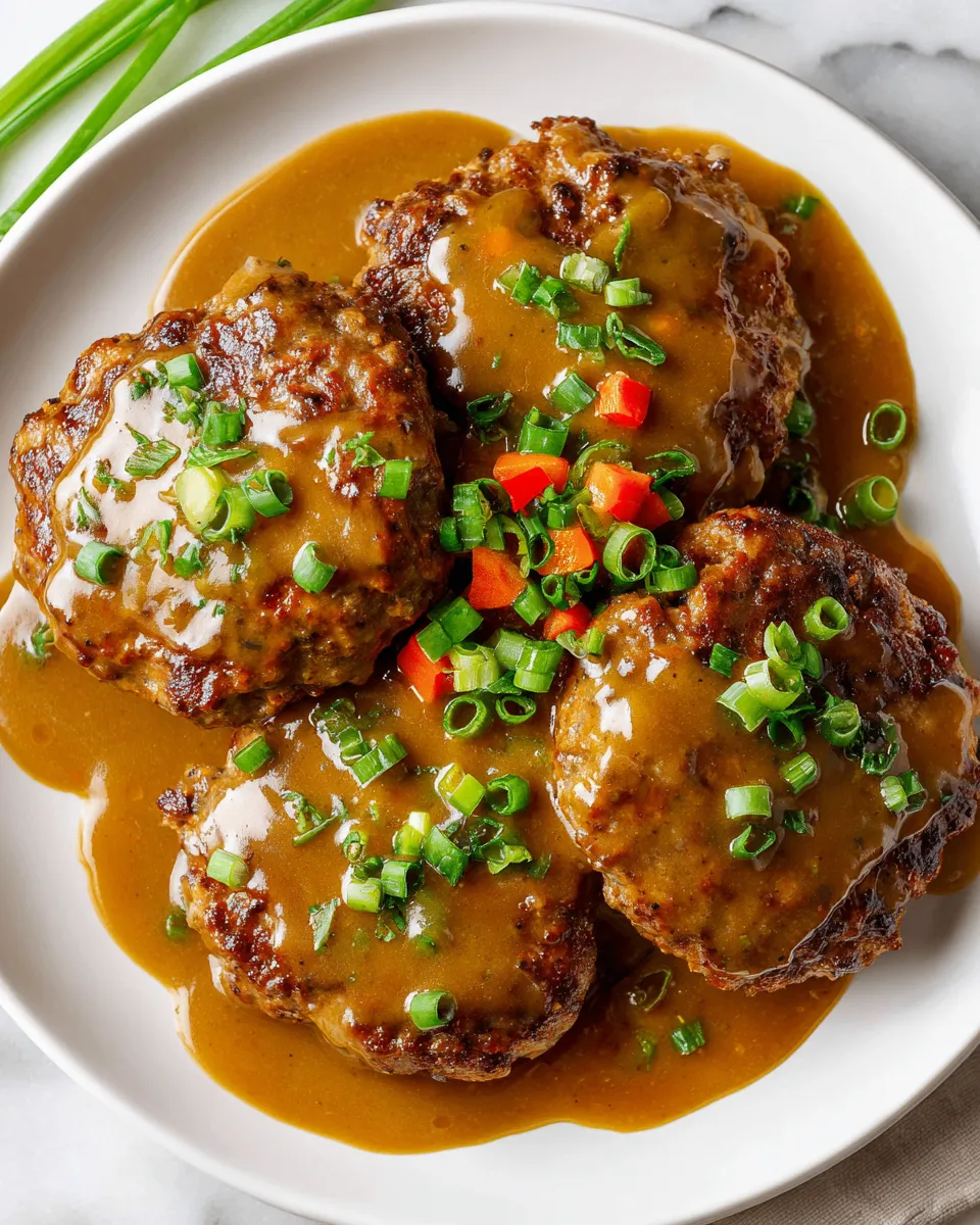 Hawaiian Hamburger Steaks served with rich gravy, quick comfort food, ideal for gatherings, and with savory flavors.