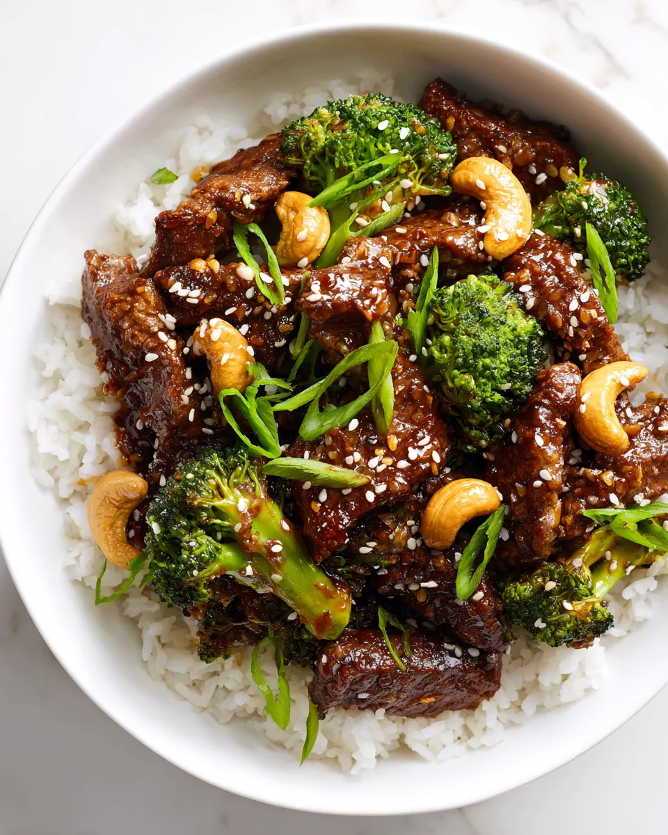 Slow Cooker Cashew Beef and Broccoli Stir-Fry with vibrant vegetables and crunchy cashews